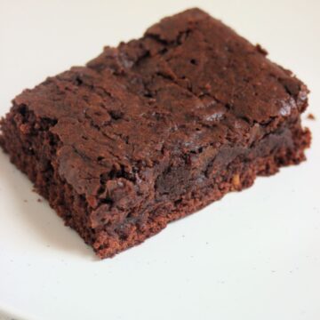 Brownie on a white plate.