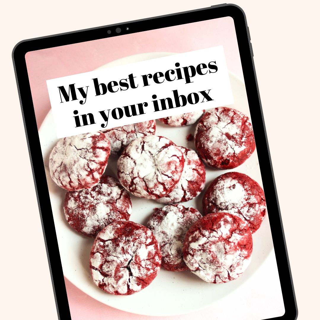 Pink background with framed images of red velvet crinkles. Black text overlay. 