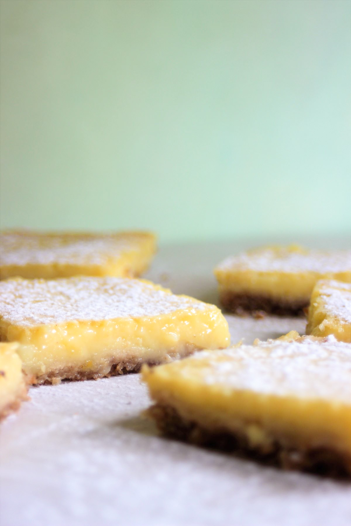 Lemon bars sprinkled with powdered sugar.