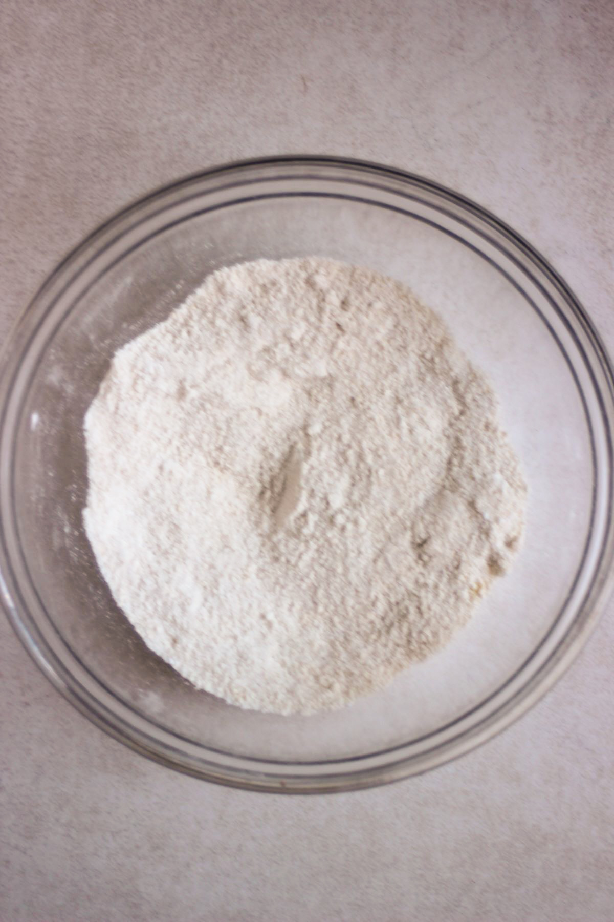 Glass bowl with a mix of flours.