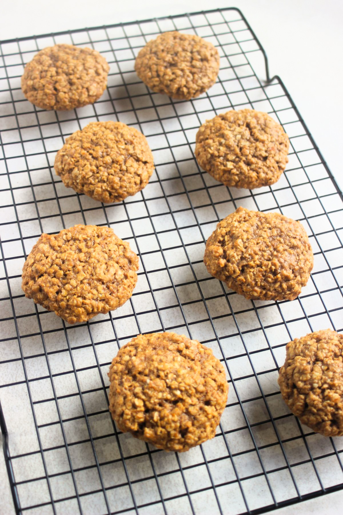Pumpkin oatmeal cookies on a wire rack.