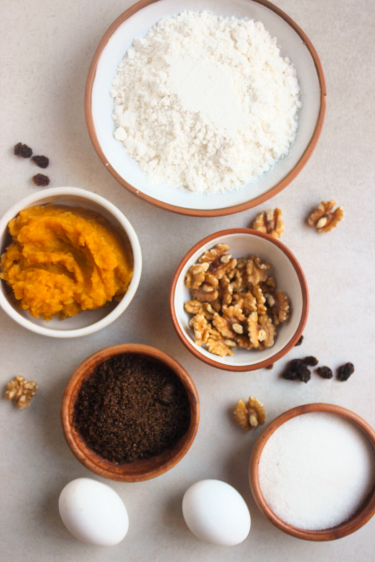 Sweet potato bread ingredients on a white surface.