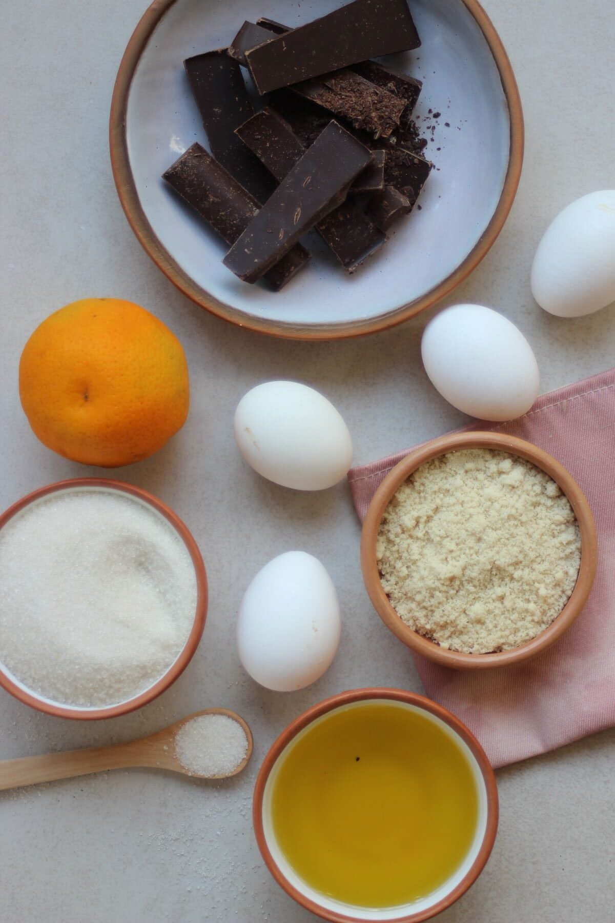 Chocolate orange cake ingredients seen from above.