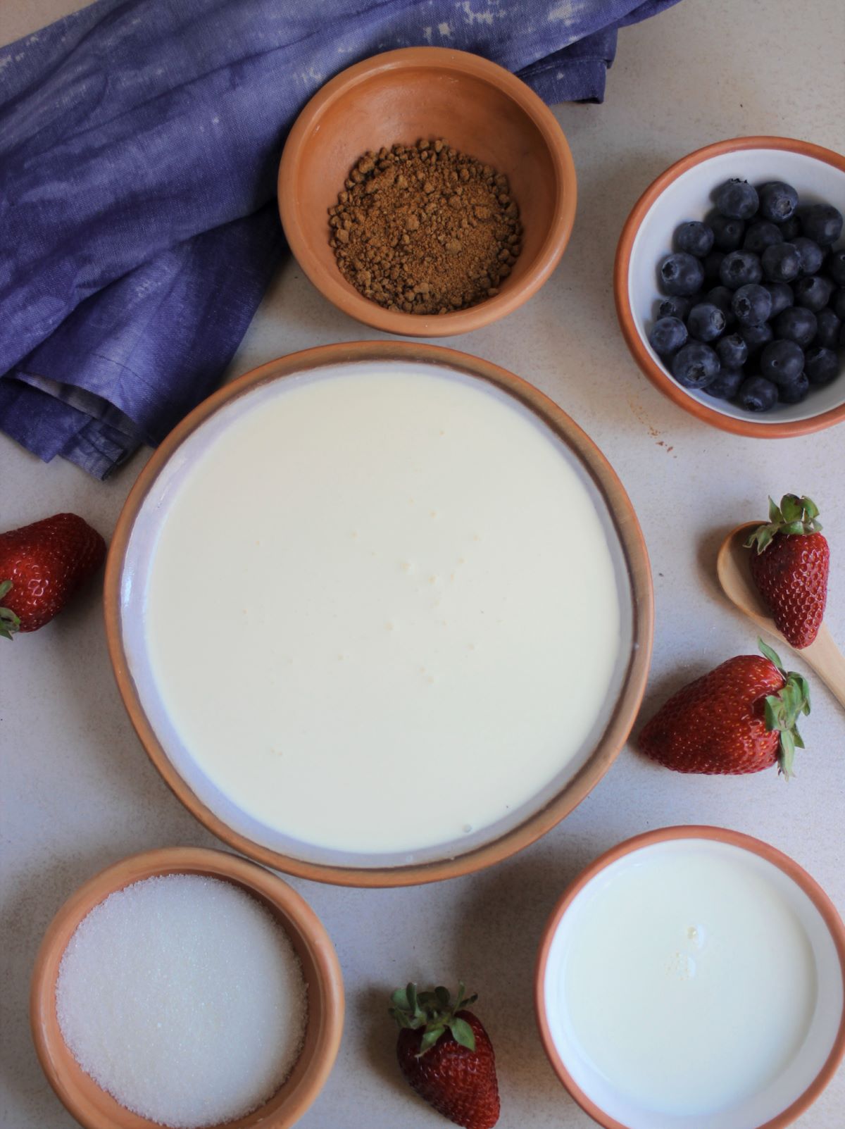 Vanilla panna cotta ingredients seen from above.