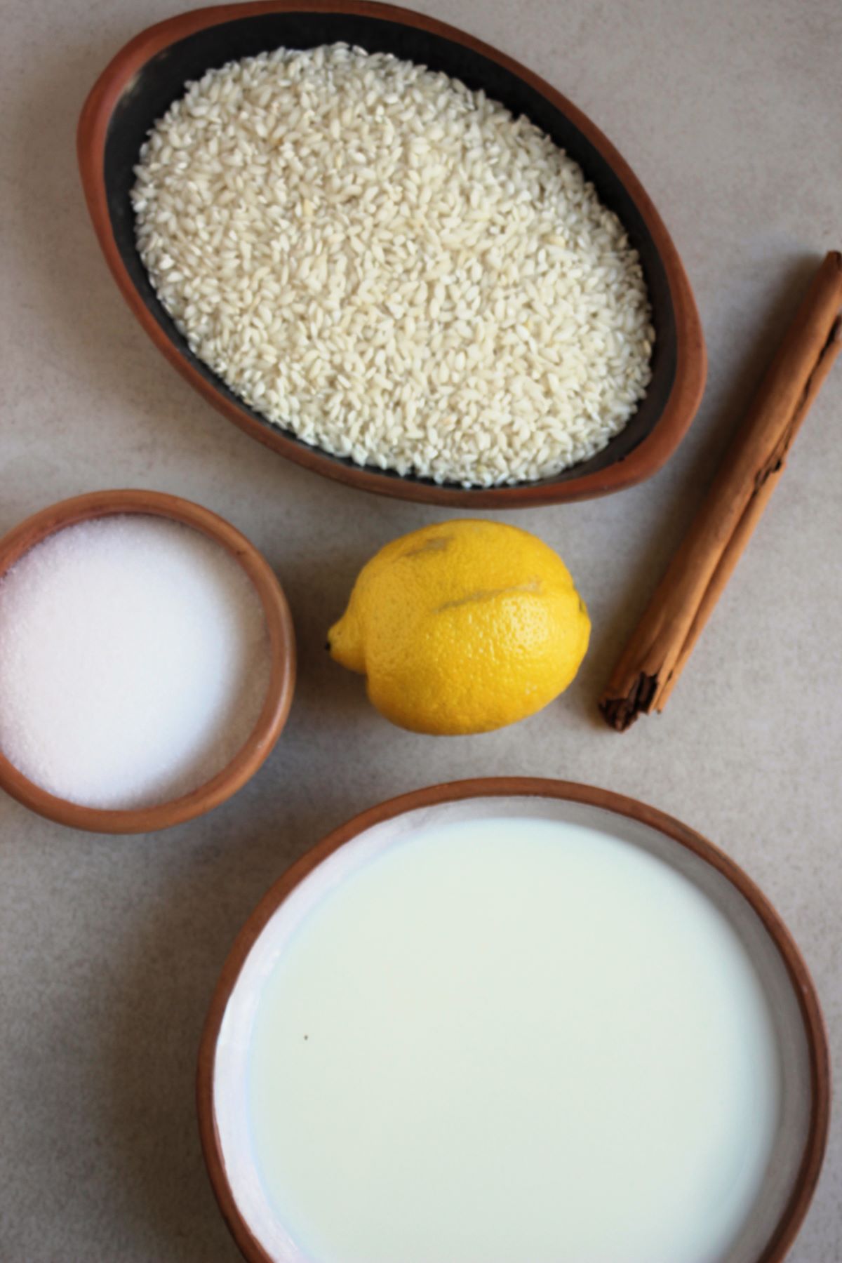 Caramel rice pudding ingredients seen from above.