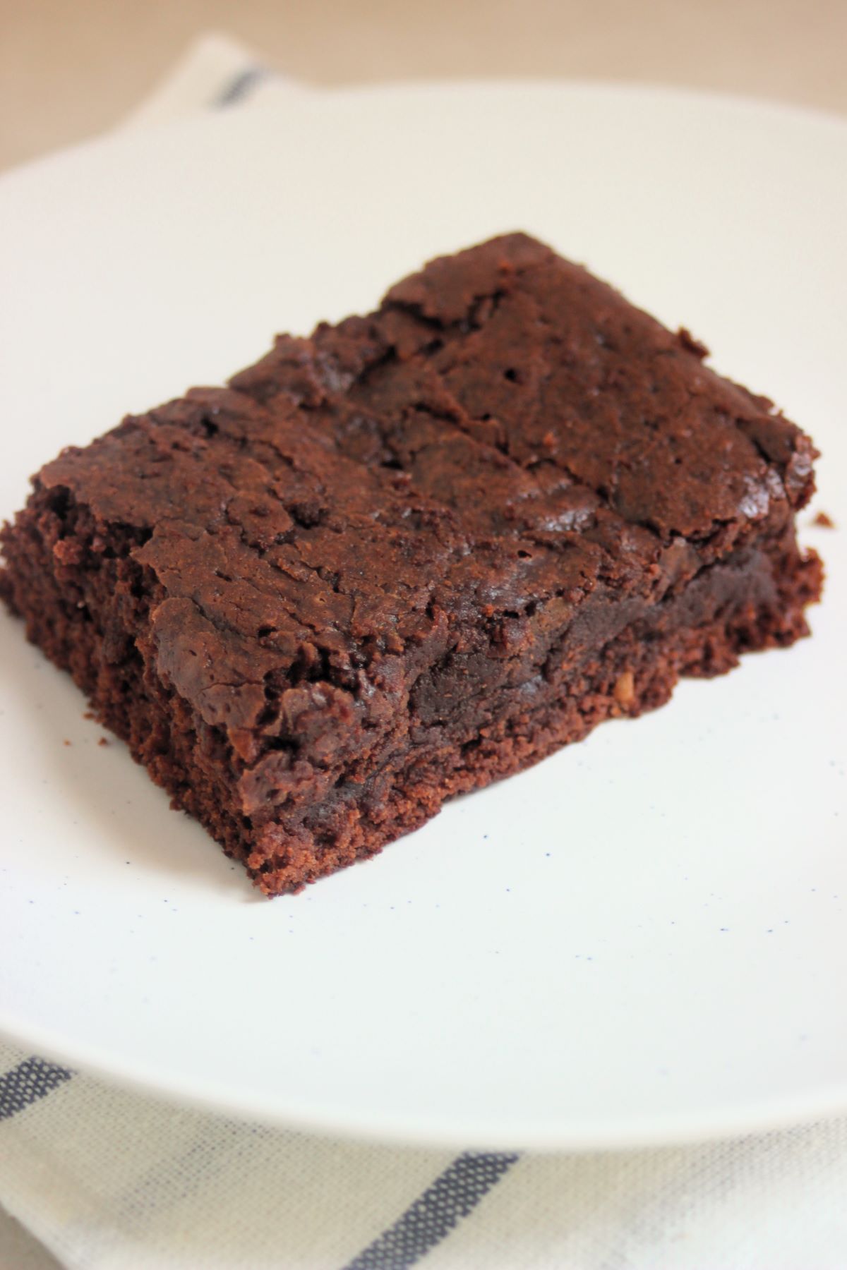 Brownie on a white plate.