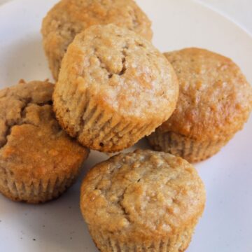 Oatmeal muffins on a white plate.