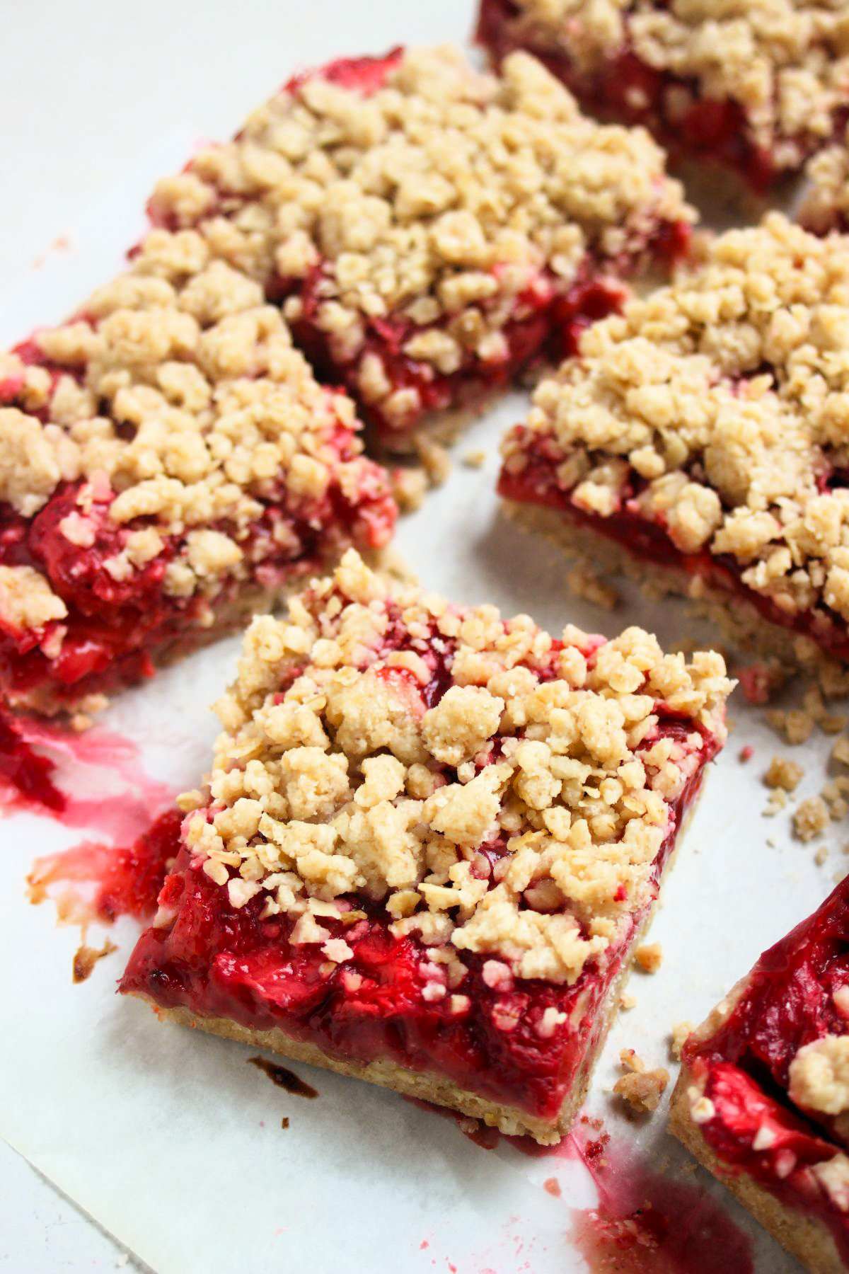 Strawberry bars on a white surface.