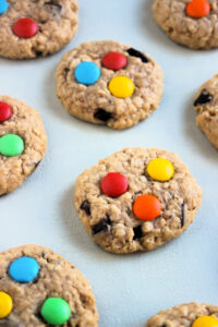Monster cookies on a white surface.