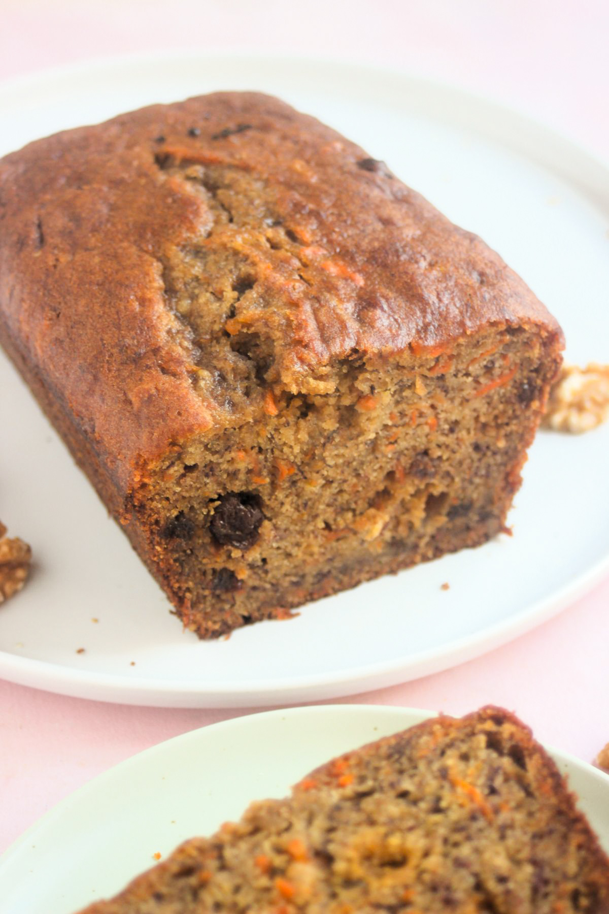 Carrot banana bread on a white plate.